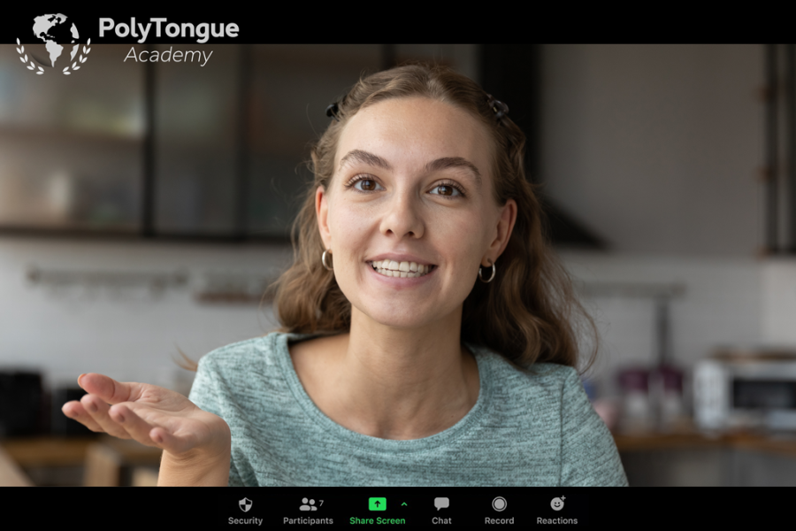 Smiling English teacher giving an online class